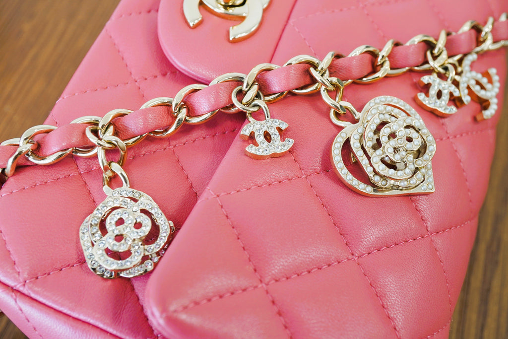 Sparkling CHANEL Charms: A Luxury Guide CHANEL MINI MATELASSE COCO BALL,CHARM CHAIN SHOULDER BAG PINK