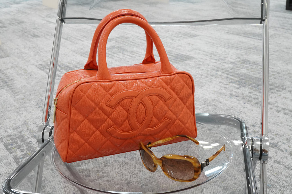 How to Style a Statement Piece: 4 Chic Ways to Wear the CHANEL Orange Caviar Mini Boston Bag