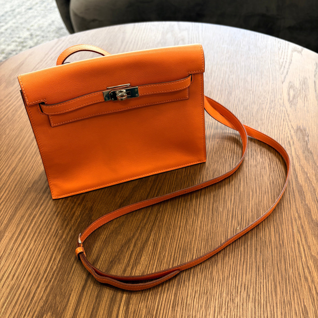 Hermès Kelly Danse Orange Veau Swift — Effortless Chic with a Twist