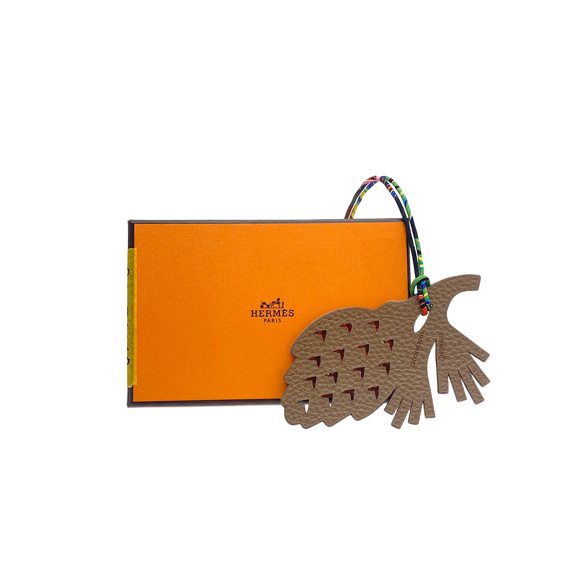 HERMES BAG CHARM PETIT H PINECONE CARAMEL NOIR EPSOM TAURILLON CLAMENCE 90276369