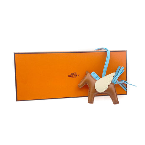 HERMES BAG CHARM RODEO PEGASUS PM GOLD CRAIE CIEL AGNEAU MILO W 90279752 - PURPOSE