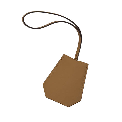 HERMES KEY CLOCHETTE CARMEN CHARM CHAI VEAU SWIFT 90283980 - PURPOSE