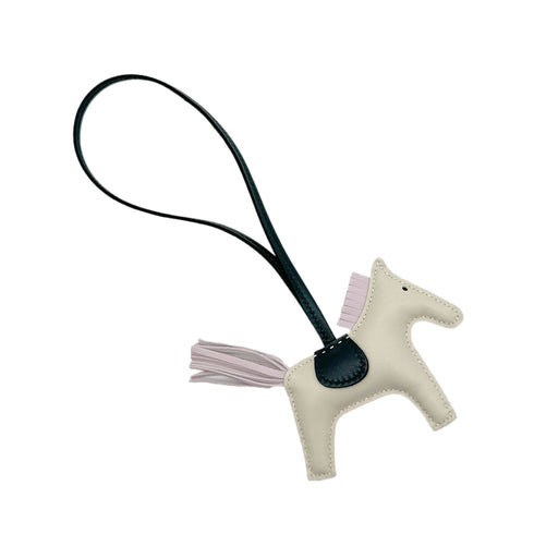 HERMES BAG CHARM RODEO PM CRAIE MAUVE PALE VERT CYPRES AGNEAU MILO 90284571 - PURPOSE