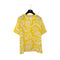 CHANEL COCO BUTTON PETOIDS SHORT SLEEVED SHIRT YELLOW SILK RTW 90285953