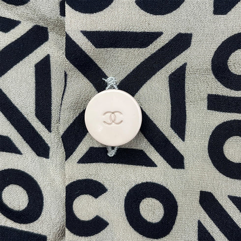 CHANEL VINTAGE COCO BUTTON LOGO SLEEVELESS BLOUSE BEIGE SILK 36 00A RTW 90287920 - PURPOSE