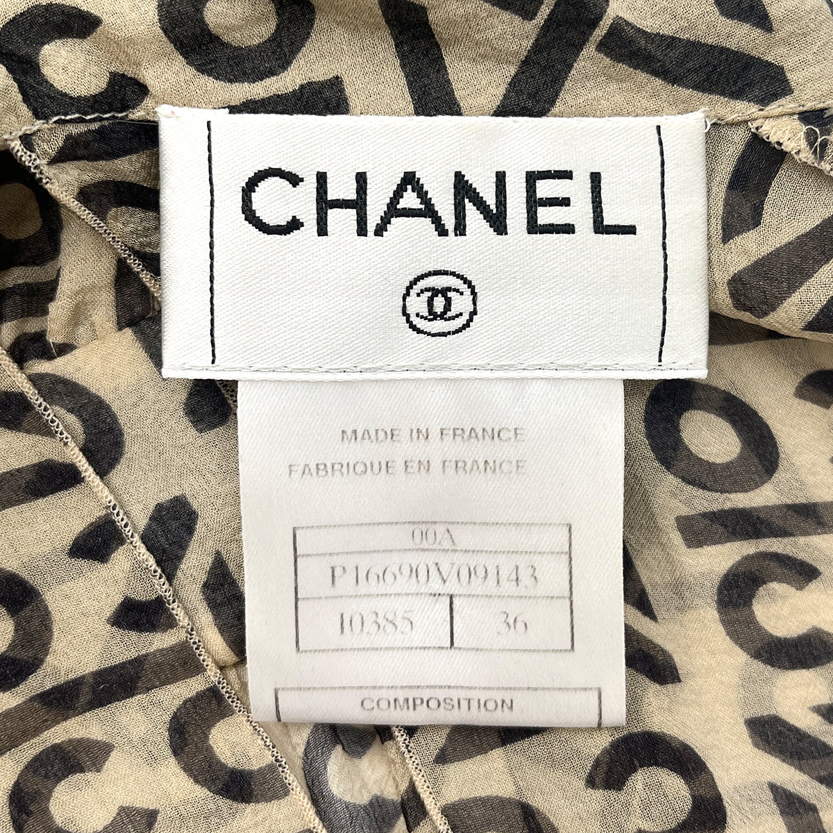 CHANEL VINTAGE COCO BUTTON LOGO SLEEVELESS BLOUSE BEIGE SILK 36 00A RTW 90287920