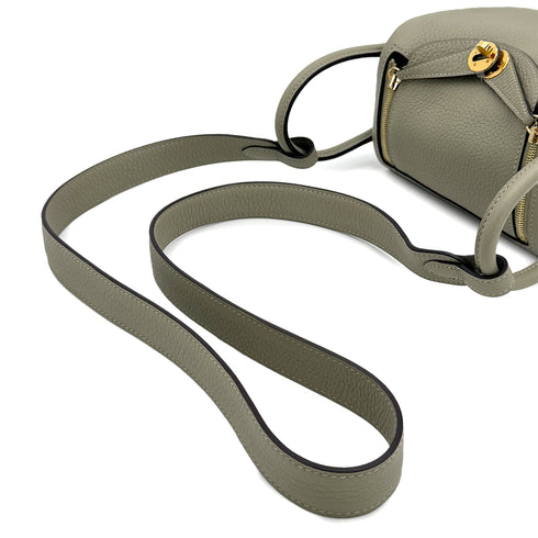 HERMES LINDY MINI SAUGE TAURILLON CLEMENCE SHOULDER BAG B GOLD HARDWARE 90308962 - PURPOSE