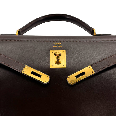 HERMES KELLY 32 SELLIER MARRON FONCE BOXCALF HAND BAG 1976 CIRCLE F GOLD HARDWARE 90308970 - PURPOSE