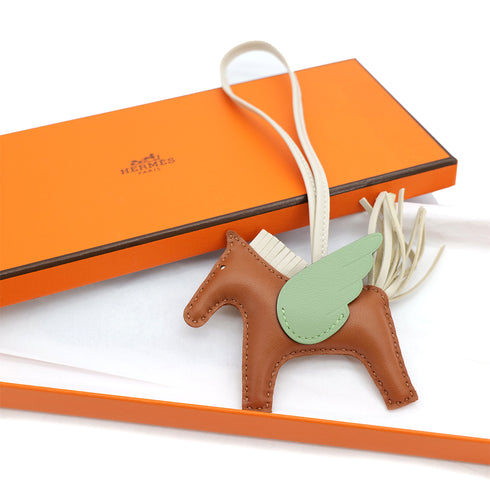 HERMES BAG CHARM RODEO PEGASUS PM GOLD CRAIE VERT CRIQUET B 90309187 - PURPOSE