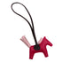 HERMES BAG CHARM RODEO PM FRAMBOISE ROSE SAKURA ROUGE SELLIER AGNEAU MILO B 90309662 - PURPOSE