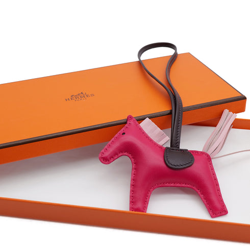 HERMES BAG CHARM RODEO PM FRAMBOISE ROSE SAKURA ROUGE SELLIER AGNEAU MILO B 90309662 - PURPOSE