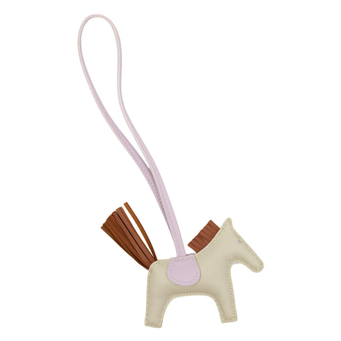 HERMES BAG CHARM RODEO PM CRAIE GOLD MAUVE PALE AGNEAU MILO U 90309663 - PURPOSE
