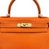 HERMES KELLY 28 RETOURNE ORANGE TAURILLON CLEMENCE HAND SHOULDER BAG □G GOLD HARDWARE 90309670