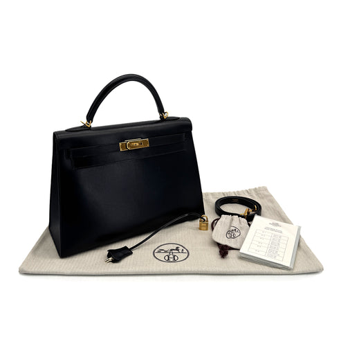 HERMES KELLY 32 SELLIER BLACK BOXCALF HAND SHOULDER BAG 2005 SQUARE I GOLD HARDWARE 90309731 - PURPOSE