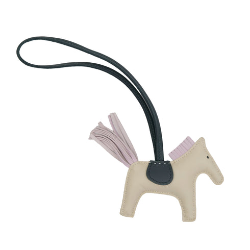 HERMES BAG CHARM RODEO PM CRAIE ROSE SAKURA VERT CYPRESS AGNEAU MILO U 90309833 - PURPOSE