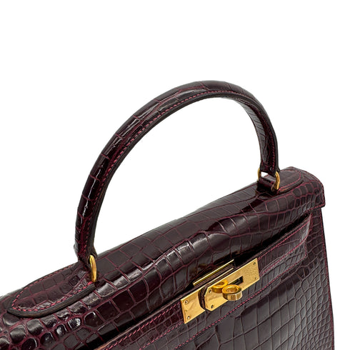 HERMES KELLY 28 SELLIER BORDEAUX CROCODILE HAND BAG 2004 CIRCLE H GOLD HARDWARE 90310278 - PURPOSE