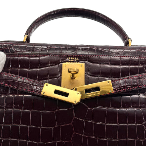 HERMES KELLY 28 SELLIER BORDEAUX CROCODILE HAND BAG 2004 CIRCLE H GOLD HARDWARE 90310278 - PURPOSE