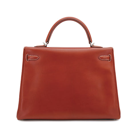 HERMES KELLY 35 RETOURNE BRICK BOXCALF HAND SHOULDER BAG 2010 SQUARE N PALLADIUM HARDWARE 90310335 - PURPOSE