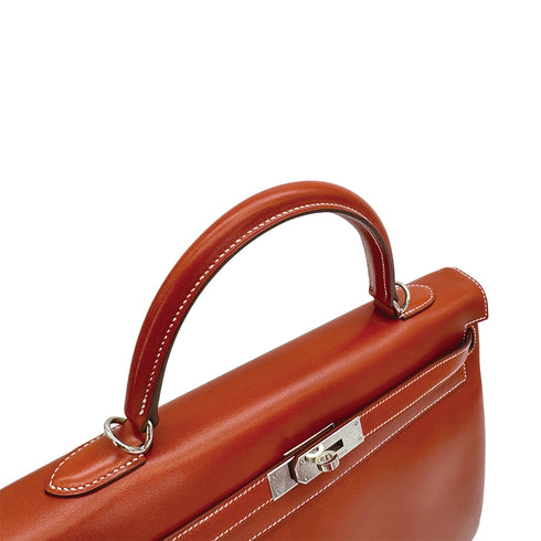 HERMES KELLY 35 RETOURNE BRICK BOXCALF HAND SHOULDER BAG 2010 SQUARE N PALLADIUM HARDWARE 90310335 - PURPOSE