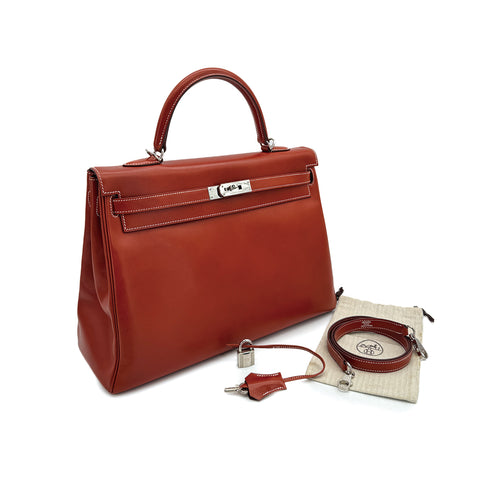HERMES KELLY 35 RETOURNE BRICK BOXCALF HAND SHOULDER BAG 2010 SQUARE N PALLADIUM HARDWARE 90310335 - PURPOSE