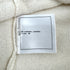 CHANEL COCO BUTTON KNIT TOPS FLOWER WHITE BLACK CASHMERE 42 P70 RTW 90324149