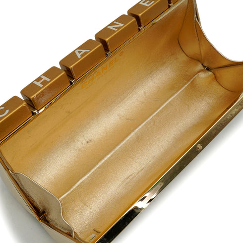 CHANEL GOLD BAR KEYBOARD CLUTCH BAG GOLD PLASTIC LEATHER 90345508