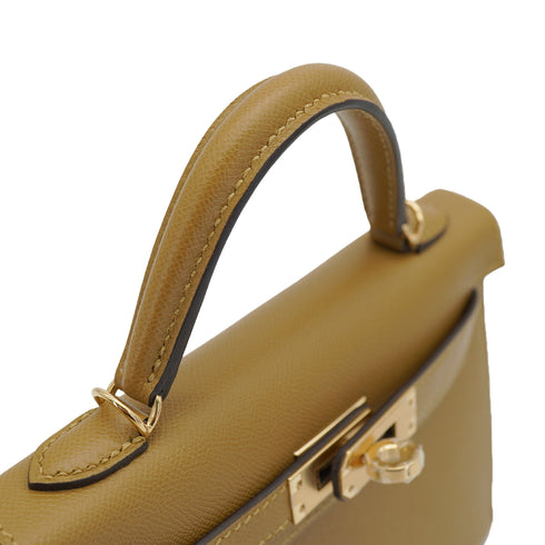HERMES KELLY MINI 2 POUSSIERE MADAME SHOULDER BAG 2026 G STAMP PERMABRASS GOLD HARDWARE 90335776