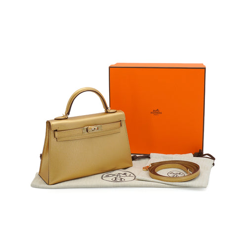 HERMES KELLY MINI 2 DORE CHEVRE CHAMKILA HAND SHOULDER BAG 2026 G STAMP PALLADIUM HARDWARE 90344348