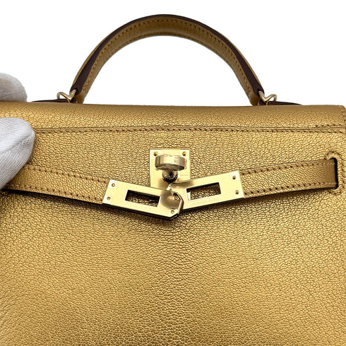 HERMES KELLY MINI 2 NEW DORE CHEVRE CHAMKILA HAND SHOULDER BAG 2025 K STAMP GOLD HARDWARE 90319696