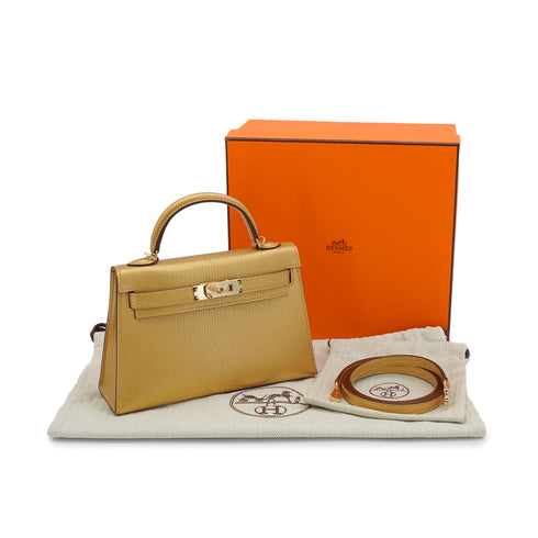 HERMES KELLY MINI 2 NEW DORE CHEVRE CHAMKILA HAND SHOULDER BAG 2025 K STAMP PERMABRASS GOLD HARDWARE 90338299