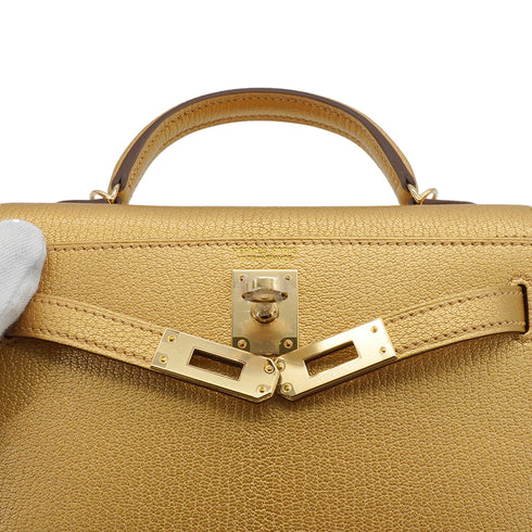 HERMES KELLY MINI 2 NEW DORE CHEVRE CHAMKILA HAND SHOULDER BAG 2025 K STAMP PERMABRASS GOLD HARDWARE 90338299