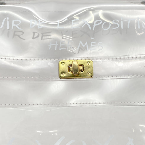 HERMES VINYL KELLY SOUVENIR DE L' EXPOSITION 1997 CLEAR HAND BAG GOLD HARDWARE 90326201