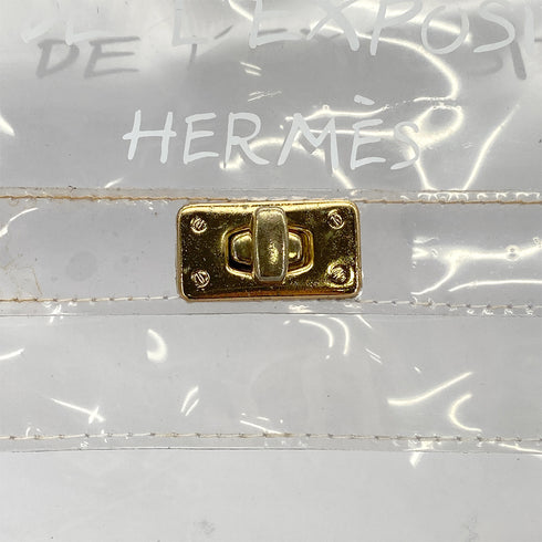 HERMES VINYL KELLY SOUVENIR DE L' EXPOSITION 1997 CLEAR HAND BAG GOLD HARDWARE 90327400