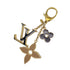 LOUIS VUITTON BAG KEY CHARM FLEUR DE MONOGRAM GOLD M67119 90323476