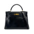 HERMES KELLY 32 RETOURNE BLACK BOXCALF HAND SHOULDER BAG 1993 CIRCLE W GOLD HARDWARE 90308965 - PURPOSE